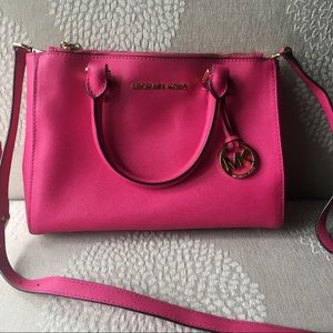Michael Kors hot pink bag with gold accents